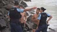 Police respond to backpackers choosing to swim as ex-Cyclone Alfred hits Bryon Bay