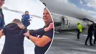 Passengers recall hanging upside down after Delta Air Lines plane flips on runway