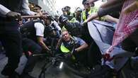 Massive police turnout sees over 50 arrested at Chicago protest