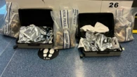 Woman charged over allegedly importing 39kg of chilli-covered drugs to Sydney Airport