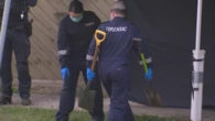 Man charged with murder after unidentified body found in Victoria