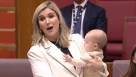 Senator upstaged by adorable sidekick in maiden speech