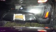 Woman caught with cardboard number plates