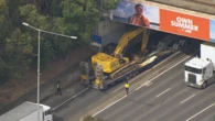 Major train, road delays after truck strikes two bridges in Melbourne