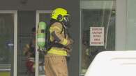 Manhunt after NSW office buildings targeted in alleged arson attack