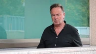 Judge's alleged violent outburst after finding 'funny' photo on partner's phone