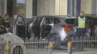 Drivers believed to be 'chasing one another' before collision in Melbourne CBD