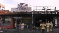 Suspected arson attack on acai restaurant spreads to pet store next door