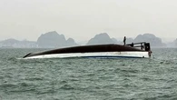 Tourist boat capsizes in Vietnam, killing 34 and trapping dozens more