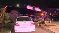 SUV smashes into parked cars, lands on Toyota Corolla on street in Sydney's south-west