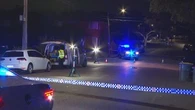 Shots fired at Sydney home as car found burned out