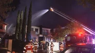 Resident leaps from balcony to escape Melbourne house fire
