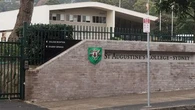 Catholic boys school teacher charged with sexually abusing student