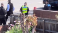 Man arrested after allegedly pointing imitation gun at people on suburban street