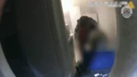 Officers rescue elderly woman in wheelchair from burning home