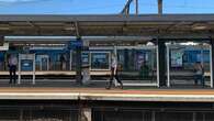 Woman in hospital after being pushed onto Melbourne train tracks by stranger