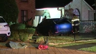 Man arrested after car crashes into home during alleged police chase