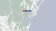 M1 closed north of Sydney after crash with one person injured and trapped in truck