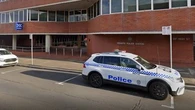 Man charged after allegedly drawing swastikas and assaulting police officer