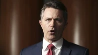 Education minister rejects 'cutting blokes out' of childcare sector