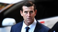 Roberts-Smith denies burying USBs to hide images from investigators