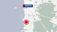 Woman speaking with homicide detectives after man's death south of Perth