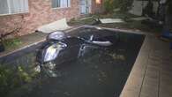 Driver makes soggy escape after crashing car into backyard pool