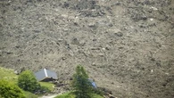 Collapsing glacier buries mountain village in rock, mud