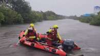 Woman feared missing in Townsville floodwaters amid widespread downpours