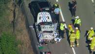 Three injured after police car hit by ute on Gold Coast highway