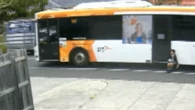 Melbourne schoolboy becomes trapped in bus doors, dragged down road