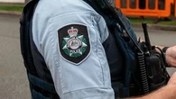 Man in immigration detention centre charged with threatening AFP officers