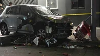 Driver who ploughed into crowd at LA club, injuring 30, shot, attacked by crowd