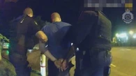 Escaped prisoner arrested after allegedly stealing and crashing car