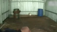 Two men found hiding in barrels after police chase