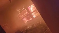 Photo shows fire devouring house as families flee in Melbourne