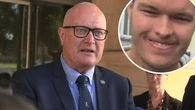Cop who held partner as he died confronts shooter in court