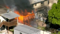Man charged after alleged arson attack destroys three homes