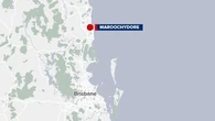Investigation launched after two found dead at Queensland beach town home