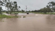 Parts of Queensland grappling with flash flooding after heavy rain