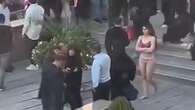 Iranian woman strips to underwear at Tehran university in protest