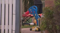 Woman charged with manslaughter after two girls killed in house fire in Melbourne