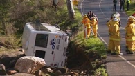 Passengers climb out back window after minibus crash near Adelaide