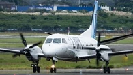 Aussies jetting overseas in record numbers despite Middle East conflict