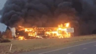 Trucks burst into flames after horror crash on Victorian highway