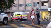 Woman dies after alleged DV assault by son in Sydney