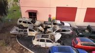 Hunt for suspected arsonist after car yard goes up in flames
