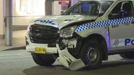 Man hit by police car as officers responded to brawl in Sydney