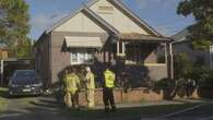 Firefighters rescue person from house fire in Sydney