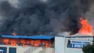 Flames engulf sports club, sending plumes of black smoke over NSW